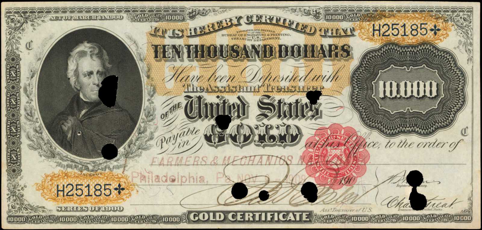 Gold-plated souvenir banknote of 10 dollars in a security file